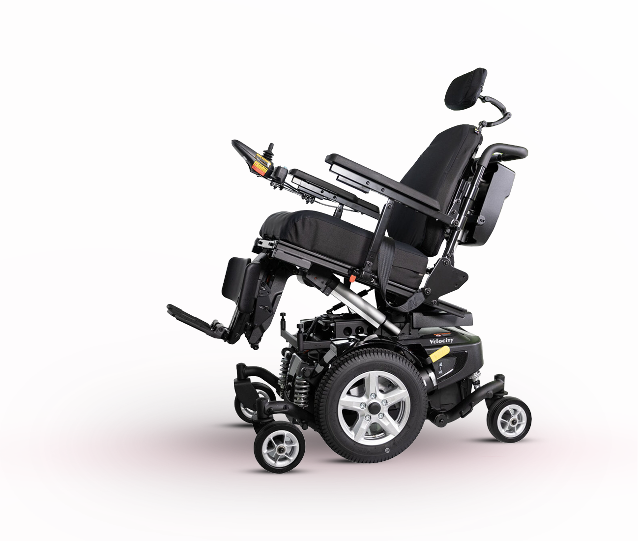 Complex Rehab power wheelchair with tilt and recline seating and elevating leg rests