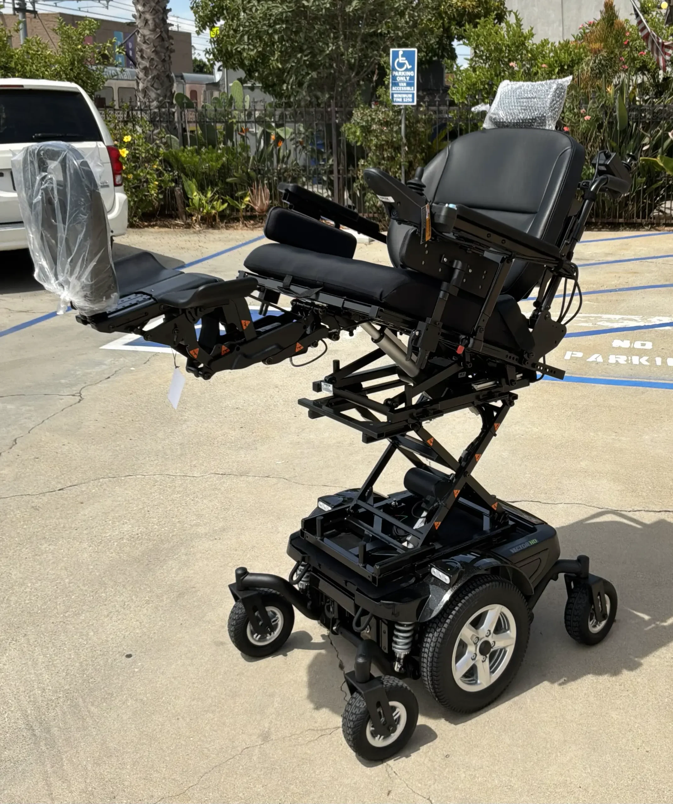 Feroz Medical patient in their custom power wheelchair on delivery day
